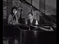 Giannis Markopoulos (beardless),Niki Kampa rehearsing a song