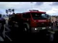 chegado dos bombeiros para conter o fogo.