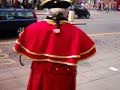 Mr Myatt is a professional town cryer and toastmaster and has won a competition as the loudest town cryer in the country. He plays a bugle as well as ringing the bell. The attire of town cryers has varied over the centuries and at one time the preferred hat was more likely to be a topper. I think this style of clothing is that of coachmen from the 19th century and is the preferred style for town cryers in modern times, complete with a tricorn hat and wig. His phone number is 01452 307958, or Mobile no. 07973 472896. The list of events at which he works: Royal, Corporate, Civic, Commercial, Celebratory, Weddings, Engagements, Anniversary, Store Openings, Promotional.