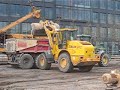 Radlader und Schlitzwandbagger