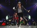 Madonna paid tribute to Michael Jackson in the same arena where he was to stage his comeback, dancing along with an impersonator doing Jackson's distinctive moves. (July 5)