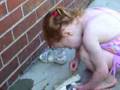 Rianna in the sprinkler yesterday