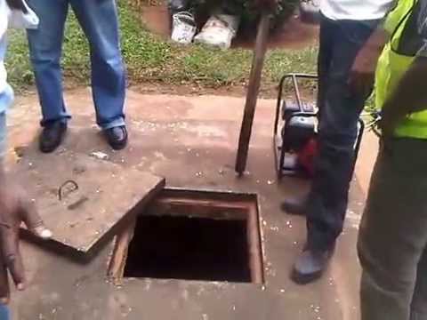 how to dissolve sludge in septic tank