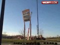 Crews Work To Repair Leaning Wal-Mart Sign