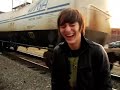 the cab has fun with a moving train. do not try this at home.