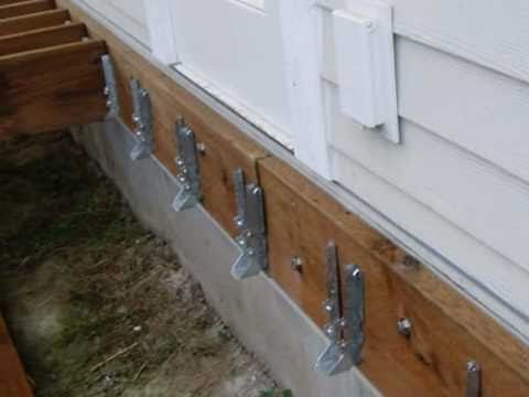how to fasten a ledger board to a house