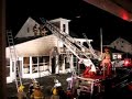 if anyone has any additional footage please contact us so that it may be (c) in your name

explosion
explosion sparks fire?
marion heights blaze leaves family homeless
marion heights ? mitch burach stood outside tower of pizza, consoling his sobbing daughter as firefighters tore through his house sunday night with chain and circular saws, hunting for vestiges of a fire that may have started with an explosion in the kitchen.

cindy marshalek was leaving tower of pizza, the business she owns with her husband, when she saw the explosion just out of the side of the house, she said.

joe was just walking up here, marshalek said of burachs son, who lived at the 100 e. north st. with his father. marshalek yelled to joseph, who yelled back to call 911 and get pop!

mitch, 87, was inside the house watching football, according to firefighters. when he went to use the bathroom, he noticed flames, they said. marshalek had run back inside tower of pizza to call 911, and when i got back out, mitch was outside, she said. 
the elder burach stood outside the restaurant, holding his daughter, whose name remained unknown at press time. he was wearing a fleece vest over a white t-shirt and what looked like blue hospital scrub pants. joseph stood nearby, leaning against the restaurant, wearing mechanics coveralls. both men were wearing only socks on their feet.

the fire call came in around 8:15 p.m., and by 8:35 p.m., most of the flames had been extinguished, though it took crews longer to work their way through the intensely hot building, checking for fire in the walls.

the sound of breaking glass could be heard over the rumble of fire trucks as crews broke out most of the windows of the building. chain and circular saws were used to cut into the interior of the house, once a bar years and years ago, according to marshalek.

as firefighters threaded their way into the building, they tore down its drop ceiling, looking for the last vestiges of the fire. outside, the structures white siding was charred and blackened, especially near the windows.

some firefighters spent quite a while in the building. one unidentified firefighter was in long enough that he was given a cursory exam by a paramedic as steam rose from the firefighters skin. after the exam, he held an ice pack to his throat, sweat pouring down his face.

fire crews were still at work by 10 p.m., and the marion heights fire company captain wasnt available for questions. a red cross representative said the burachs would be staying with family, and the agency was going to help with clothing and other items.

assisting marion heights fire company were kulpmont, atlas, anthracite steam, west end, east end, and mount carmel fire companies and the city of shamokin fire bureau, area services, and mount carmel area rescue squad.

from the shamokin news item