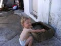 Playing at Water Spigot Playing at Water Spigot