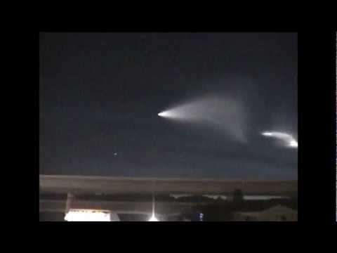missle - driving down the road saw this in the sky. i think it was a missle, but never really heard what it was.