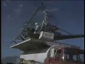 Helicopter at work landing on truck