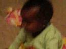 Jayda playing and laughing on the bed