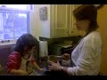 Claire and. Mama cooking muffins 11-22-09