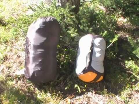 how to fasten sleeping bag to backpack