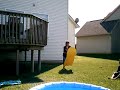 my friend trying to go down a water slide