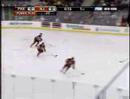 Keith Ballard hipchecks Rod Pelley