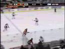 Keith Ballard hipchecks Rod Pelley