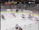Keith Ballard hipchecks Rod Pelley