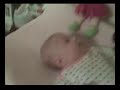 10 9 09 Kaitlyn talks and giggles at her wallpaper