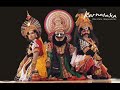 you can download a good quality version from http://rapidshare.com/files/107852447/nadageethe_0001.wmv.html

?? ???? ????? ???????,?? ?? ??????? ????
?? ????? ??????? ???? ?? ?? ?? ????? ????.
??????? ????? ??????? ???? ???? ??????? ?????
???? ??????????????? ???? ????? ??????? !

????? ????? ???? ???,?????? ????? ?????????,
?????? ?????? ????, ?????? ?????? ????,
???? ????? ???? ??????,???? ????? ??????? !

???? ??????? ??????????,??????????? ??????????
???? ??????? ?????,??? ???????? ????
????????????? ???? ???,??? ???????? ?????????
???? ??????? ????? ???? ????? ??????? !

???? ??????????? ????,???? ???? ?????? ????
????? ?????? ????,??????? ?? ???
?????? ?????? ??????,???? ????? ??????? !

???? ?????? ?????? ???,????? ???? ??????? ???
????? ??????? ????????,?????? ??????????
???? ????? ?????? ???,???? ??????????
????? ???? ????????? ???,????? ????? ????? ???
???? ????? ???????,?? ?? ??????? ????
                          - ?? . ???????
'jai bharatha jananiya thanujathe' is a famous and a very beautiful song patriotic song of the land written by a great kannadiga, rashtra kavi dr. k. v. puttapa (kuvempu). the song is also the state anthem of karnataka.

the beauty and the central theme of the song is that it envisages a karnataka that is very proud of its position in the comity of indian states. mother karnataka is called a proud daughter of mother india who believes in peaceful co-existence with her sisters, but at the same time maintains her self-respect and dignity.

through the poem, the poet appreciates the greatness of the state of karnataka by highlighting its glorious culture, divinity and heritage, architectural splendor, geographical treasures, the great kings, poets, intellects of the land and peaceful co-existence of people in diversity.

the translation of the song  into english (as in wikipedia) reads - 

victory to you mother karnataka, the daughter of mother india! 
hail the land of beautiful rivers and forests, hail the abode of saints! 
you are a new jewel in the crown of goddess earth, mine of beautiful gold and sandal. 
victory to you mother karnataka the daughter of mother india where rama and krishna had their incarnations.

resonance of the vedas is your mother's lullaby for you, and your fervor is her life. lines of green mountains are your necklaces. 
victory to you mother karnataka, the daughter of mother india who is hailed by kapila, patanjali, gautama and jina.

you are a sacred forest where shankara, ramanuja, vidyaranya and basaveswara dwelt. you are the holy abode where ranna, shadakshari, ponna, pampa, lakshmisha and janna were born. 
you are the blessed resting place of many a poet-nightingales. victory to mother karnataka, the daughter of mother india who gave birth to nanak, ramanand and kabir.

this is the land ruled (in the past) by tailapa and hoysalas, and affectionate hometown for dankana and jakkana. this land is the blessed stage for krishna, sharavathi, tunga and kaveri. victory to you mother karnataka, the daughter of mother india of chaitanya, paramahamsa and vivekananda.

garden of peace for all communities, a sight that allures the connoisseurs, the garden where the hindus, christians, muslims, parsis and the jains (grow); the palace of many kings that are like janaka; the place for singers and musicians; the body of the children of mother kannada -- the house where kannada tongue plays in joy. 

victory to you mother karnataka, the daughter of mother india. hail the land of beautiful rivers and forests, hail the abode of rasarishis!