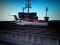 fs 2004 Fokker-100 OceanAir pousando em um Porta-Aviões