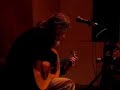 guitarist peter walker performs a flamenco-influenced guitar piece at synapsis gallery in eureka, november 2006.