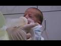 Isabel's First Bottle Feeding