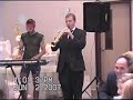 My brothers and cousin singing at my wedding to me and my new husband!