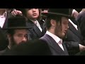 from the chanuka menorah lighting of munkach grand rabbi at the main synagogue in brooklyn. this sample contains the sixth and final stanza of maoz tzur as sung by the munkach yeshiva choir. 3rd night chanuka 5766 (2006). see the other video for the full movie. contact synagogue officers to buy the cd. the cd shows almost as clear as a dvd.