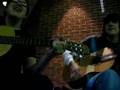 Jameson and Zac playing guitar