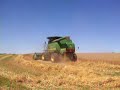 John Deere 9550 cutting wheat