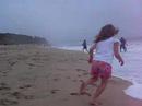 garrett and taylor playing on the beach at half moon bay while enjoying a visit from their uncle pete