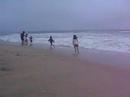 garrett and taylor playing on the beach at half moon bay while enjoying a visit from their uncle pete