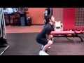 Kettlebell Jump Squat - Perform 12-15 jump squats while holding a kettlebell.