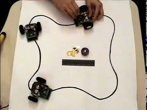 hizook - This wireless power system is similar to low-frequency RFID. There is a coil embedded under the table (like a RFID reader) that powers the robots (like tags)...