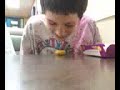 Frankie eating a chicken nugget