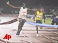 Bolt Races to 100 Meters World Record