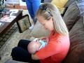 Aunt Betsy giving baby Jayme a little PT eval