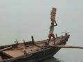 Hard labour, guy stacking 20 bricks on his head
