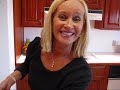 In this video, Betty demonstrates how to make Sausage and Egg Breakfast Casserole. This is an easy casserole you can make one or two days ahead and bake it as a breakfast for company. Ingredients: slices of bread with crusts removed (I used 6 large slices of hearty whole grain bread.) ½ stick butter, softened 1 pound sausage, browned and drained 6 eggs, well-beaten 2 cups milk 1 pound Cheddar cheese, shredded Thinly butter both sides of 6 large slices of bread. Line the bottom of a 13-inch by 9-inch by 2-inch baking dish, cutting bread and piecing the slices to fit the bottom of the dish. Cover the buttered bread slices with 1 pound of browned, crumbled sausage. Mix 6 well-beaten eggs and 2 cups milk together. Pour egg mixture over bread and sausage. Top with 1 pound shredded Cheddar cheese. Cover casserole with aluminum foil and refrigerate overnight. The next morning, bake the casserole 45 minutes in a 350 degree (F) oven, leaving foil as a covering. After 45 minutes, remove foil and bake 15 additional minutes. Remove casserole from oven and drain any fat that has accumulated from the melted cheese. Let casserole sit for about 10 minutes, then cut into squares and serve. This casserole tastes great and it is a very convenient way to treat you guests to an easy, but special, breakfast. I hope you love it! --Betty :)