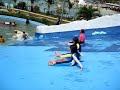 Kids Sliding Down the Kiddie Pool