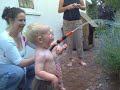 Dan T-S and Oliver with the hose Dan T-S and Oliver with the hose