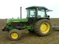 Corn rolling on a john deere 2850 with alex driving