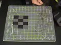the button flower quilt pattern was designed in the spirit of the  american arts and crafts movement of the early 1900's. in this episode of designing by thread, terry shows simple techniques for machine applique and strip piecing.  part 2