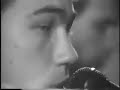 set in the past, yet futuristic, while the missles are coming in cold war love song.  film footage from 1983 of childsupport performing 
