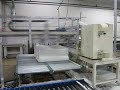 This machine cuts carpet to length. In this section it stacks the carpet after it has been cut.It is able to do cut to length or by using a camera cut on a pattern line fully automatic