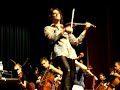 mark wood performs with the st. charles high school orchestra in st. charles, mo on september 8, 2007 at st. charles west high school. a power outage caused a last minute change of venue, but mark, the orchestra and the sound technicians from mozingo music rose to the challenge and the show went on . . . awesomely!