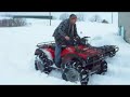 Honda 450 with 28 inch mudlites pulling on a Honda 500