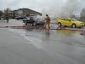 car starts on fire in wal-mart west bend parking lot