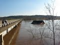 House Colliding with Bridge