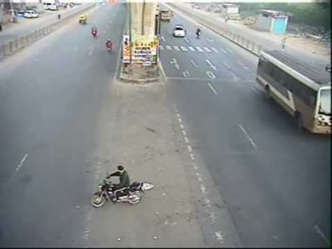Dangerously Close Accident - Car hits Two Wheeler by Bangalore Traffic Police